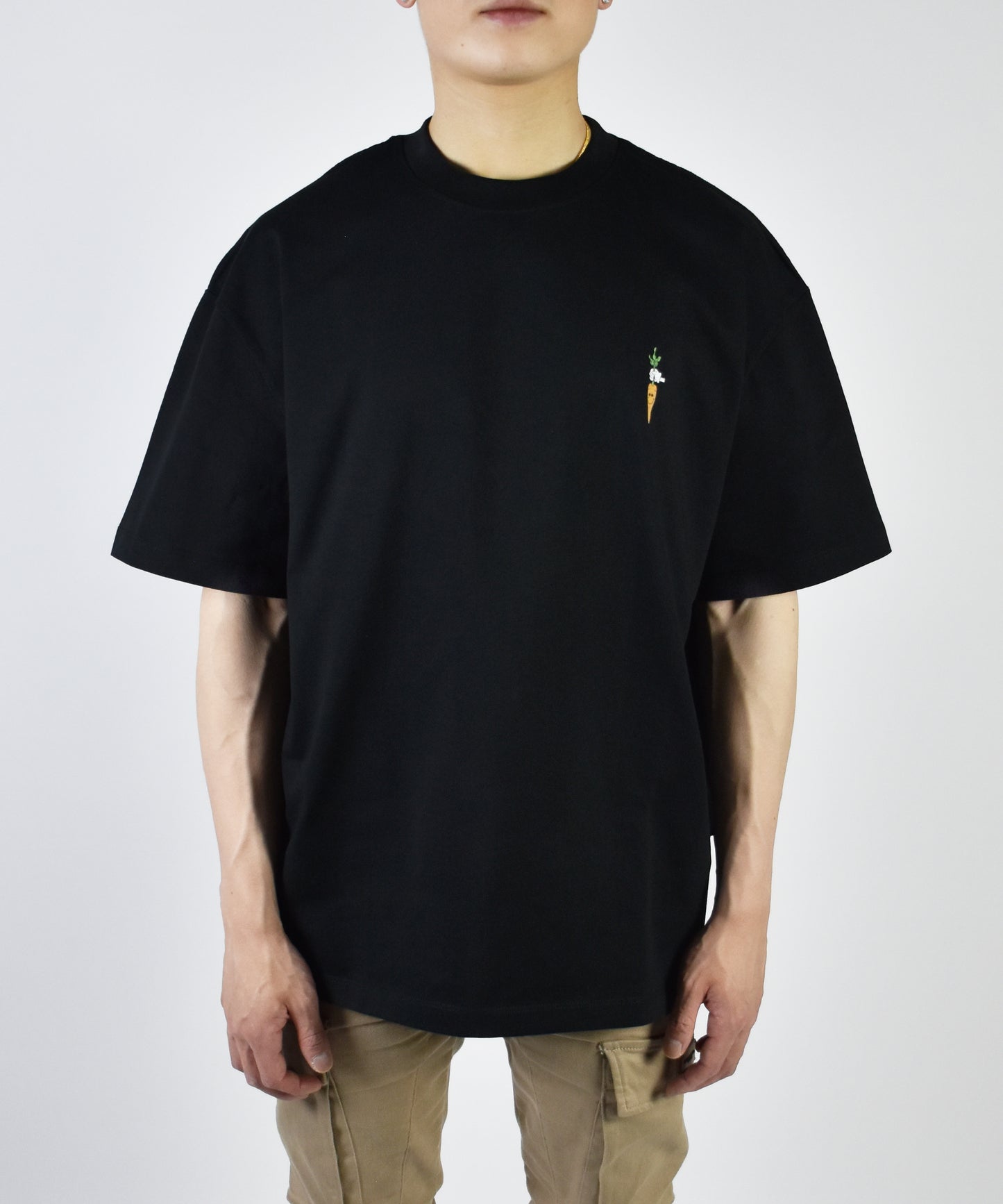 Uniqk Carrot Stick Black Oversized T-shirt Model Front